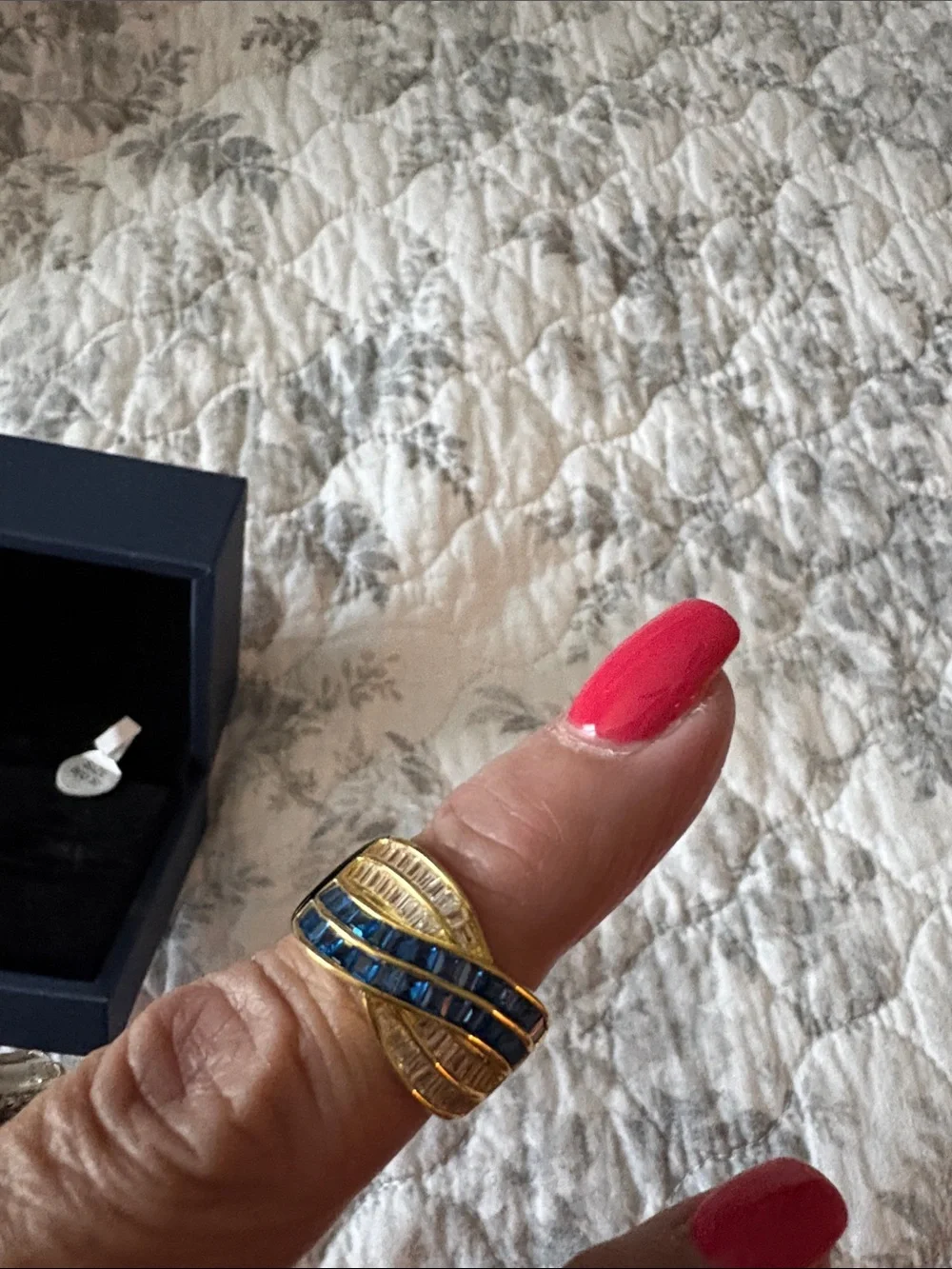 Gold-tone Wave Ring with Blue and Clear Stones